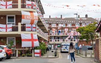 epa09335569 General view of the Kirby Estate which has been decorated in England flags in London, Britain, 10 July 2021. England will face Italy in the UEFA EURO 2020 Final soccer match at Wembley Stadium in London on 11 July 2021.  EPA/VICKIE FLORES