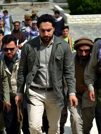 Ahmad Massoud (C) son of late Afghan commander Ahmad Shah Massoud, arrives to attend and address a gathering at the tomb of his late father in Panjshir province on July 5, 2021. (Photo by Ahmad SAHEL ARMAN / AFP) (Photo by AHMAD SAHEL ARMAN/AFP via Getty Images)