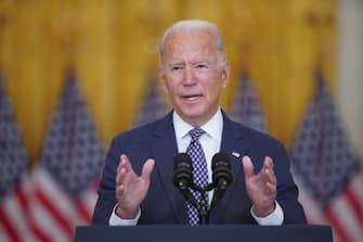 U.S. President Joe Biden speaks in the East Room of the White House in Washington, D.C., U.S., on Friday, Aug. 20, 2021. Theres mounting evidence the Taliban are cracking down on dissent in Afghanistan and carrying out reprisals, even after its leadership promised an amnesty, adding urgency to global efforts to evacuate those most at risk. Photographer: Al Drago/Bloomberg via Getty Images