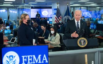 US President Joe Biden speaks about Hurricane Ida alongside FEMA Administrator Deanne Criswell (L) during a visit to FEMA Headquarters in Washington, DC, August 29, 2021. - Hurricane Ida struck the coast of Louisiana Sunday as a powerful Category 4 storm, 16 years to the day after deadly Hurricane Katrina devastated the southern US city of New Orleans."Extremely dangerous Category 4 Hurricane Ida makes landfall near Port Fourchon, Louisiana," the National Hurricane Center wrote in an advisory. (Photo by SAUL LOEB / AFP) (Photo by SAUL LOEB/AFP via Getty Images)