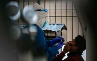 Coronavirus swab tests are conducted a Las Casas Health Center in the northwestern part of Quito, Ecuador, on February 2, 2021. (Photo by Rafael Rodriguez/NurPhoto via Getty Images)