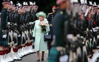 Queen Elizabeth II inspects The Royal Scots Borderers, 1st Battalion The Royal Regiment of Scotland, as she is formally received into the City of Edinburgh at Palace of Holyroodhouse , Edinburgh, during the Ceremony of the Keys, where she was handed the keys of the city.