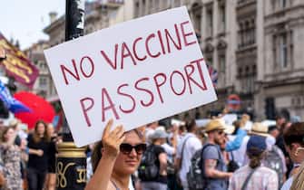 LONDON, UNITED KINGDOM - 2021/07/19: A protester holds a placard expressing her opinion during the demonstration.
Thousands of people gathered near Parliament Square in a protest against health passports, protective masks, Covid-19 vaccines and lockdown restrictions. (Photo by Pietro Recchia/SOPA Images/LightRocket via Getty Images)