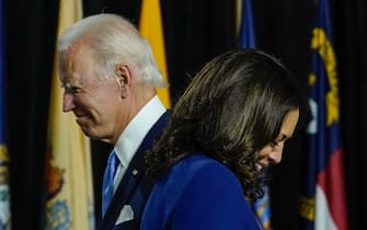 WILMINGTON, DE - AUGUST 12: Presumptive Democratic presidential nominee former Vice President Joe Biden invites his running mate Sen. Kamala Harris (D-CA) to the stage to deliver remarks at the Alexis Dupont High School on August 12, 2020 in Wilmington, Delaware. Harris is the first Black woman and first person of Indian descent to be a presumptive nominee on a presidential ticket by a major party in U.S. history. (Photo by Drew Angerer/Getty Images)