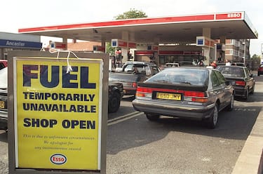 Esso Petrol Station, During the fuel crisis, showing signs on the forecourt stating 'Fuel temporarily unavailable'. (Photo by Photoshot/Getty Images)