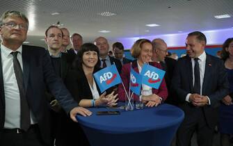 epa09490007 Alternative for Germany (AfD) right-wing political party co-chairman and top candidate for the upcoming federal elections, Tino Chrupalla (2-R) and deputy leader, Beatrix von Storch (3-R) during the Alternative for Germany (AfD) election event in Berlin, Germany, 26 September 2021. About 60 million Germans were eligible to vote in the elections for a new federal parliament, the 20th Bundestag.  EPA/MARTIN DIVISEK / POOL
