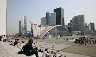 People enjoy the sunny weather on La Defense despite the Coronavirus Pandemic in Paris, France, on April 01, 2021. Critical care doctors in Paris say surging coronavirus infections could soon overwhelm their ability to care for the sick in the French capital hospitals, possibly forcing them to choose which patients they have the resources to save. President Macron is expected to give a TV speech on Wednesday detailing possible new restrictions to fight Covid-19. Photo by Jerome Domine/ABACAPRESS.COM