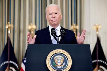 WASHINGTON, DC - SEPTEMBER 24: U.S. President Joe Biden gestures as he delivers remarks on his administrationâ  s COVID-19 response and vaccination program from the State Dining Room of the White House on September 24, 2021 in Washington, DC. President Biden announced that Americans 65 and older and frontline workers who received the Pfizer-BioNTech COVID-19 vaccine over six months ago will be eligible for booster shots. (Photo by Anna Moneymaker/Getty Images)