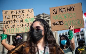 People protest demanding the decriminalization of abortion during the Global Day of Action for Legal and Safe Abortion in Latin America and the Caribbean, outside the Justice Palace in Lima, on September 28, 2021. (Photo by ERNESTO BENAVIDES / AFP) (Photo by ERNESTO BENAVIDES/AFP via Getty Images)