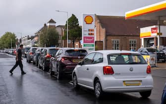 As the fuel crisis in the UK continues, this Shell petrol station is open for business as usual, motorists arrive in with their cars to fill up with fuel on the 1st of October 2021 in Folkestone, United Kingdom. Almost all the petrol stations in Folkestone have no fuel, this Shell garage took a delivery recently and now has queues over half a mile in both directions. People have been waiting for more than 2 hours to get fuel. Panic buying and long queues outside some petrol stations as the crisis, which has been caused by a lack of HGV drivers available to deliver supplies, continues. (photo by Andrew Aitchison / In pictures via Getty Images)