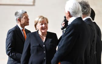 German Chancellor Angela Merkel (C) and her husband Joachim Sauer (L)  arrive for a private audience with Pope Francis, at San Damaso courtyard in Vatican City, 07 October 2021.   ANSA/ETTORE FERRARI
 