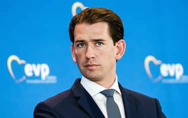 epa09458018 Austrian Chancellor Sebastian Kurz looks on during a press conference at an EPP Group Bureau meeting in Berlin, Germany, 09 September 2021. The European People's Party (EPP) Group Bureau holds a meeting from 08 to 10 September in Berlin.  EPA/CLEMENS BILAN