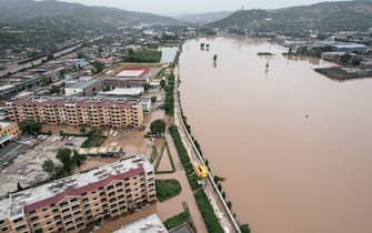 This aerial photo taken on October 10, 2021 shows a flooded area after heavy rainfalls in Jiexiu, in Jinzhong city, China's northern Shanxi province. - China OUT (Photo by STR / AFP) / China OUT (Photo by STR/AFP via Getty Images)
