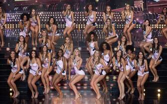 1230220538 Contestants compete during the Miss France 2021 beauty contest at the Puy-du-Fou, in Les Epesses, western France, on December 20, 2020. - Miss Normandie Amandine Petit had been elected Miss France 2021, Miss Provence April Benayoum is her first runner-up and Miss Cote d'Azur Lara Gautier is her second runner-up. (Photo by LOIC VENANCE / AFP) / RESTRICTED TO EDITORIAL USE - NO MARKETING - NO ADVERTISING CAMPAIGNS (Photo by LOIC VENANCE/AFP via Getty Images)