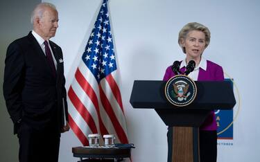 US President Joe Biden listens while European Commission President Ursula von der Leyen addresses the press during the G20 Summit at the Roma Convention Center La Nuvola October 31, 2021, in Rome, Italy. (Photo by Brendan Smialowski / AFP) (Photo by BRENDAN SMIALOWSKI/AFP via Getty Images)
