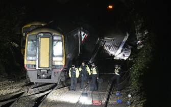 Emergency services at the scene of a crash involving two trains near the Fisherton Tunnel between Andover and Salisbury in Wiltshire. Fifty firefighters are at the scene of the collision in which up to a dozen passengers are believed to have been injured. Picture date: Monday November 1, 2021.