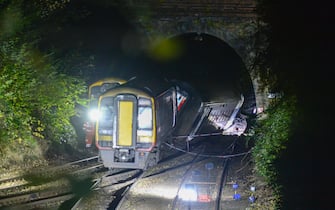SALISBURY, ENGLAND - NOVEMBER 01: The scene of the train collision on November 1, 2021 in Salisbury, England. The incident occurred when a Bristol-bound train struck an object in the Fisherton Tunnel and derailed, and was then struck by a Honiton-bound train. (Photo by Finnbarr Webster/Getty Images)