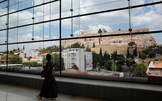 epa09288417 The Parthenon as seen from the Acropolis Museum during its 12th birthday, in Athens, Greece, 20 June 2021. On 20 June 2021 the Acropolis Museum celebrates its twelfth anniversary, having undergone its most difficult year to date, as it remained closed to the public for more than six months due to the Covid-19 pandemic. The Acropolis Museum, now refreshed and renewed, welcomes its visitors on the day of its birthday with reduced entry to all exhibition areas. Additionally, visitors will have the opportunity to participate in the new thematic presentation 'Marathon-Salamis. In traces of myth and history'.  EPA/ALEXANDROS VLACHOS