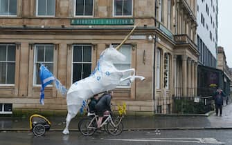 Protesters enroute to take part in a rally organised by the Cop26 Coalition in Glasgow demanding global climate justice. Picture date: Saturday November 6, 2021. (Photo by Andrew Milligan/PA Images via Getty Images)