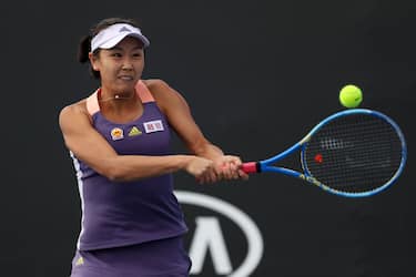MELBOURNE, AUSTRALIA - JANUARY 23: Shuai Peng of China plays a backhand during her Women's Doubles first round match with partner Shuai Zhang of China against Veronika Kudermetova of Russia and Alison Riske of the United States on day four of the 2020 Australian Open at Melbourne Park on January 23, 2020 in Melbourne, Australia. (Photo by Clive Brunskill/Getty Images)