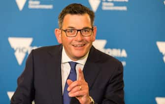 MELBOURNE, AUSTRALIA - NOVEMBER 18: Premier of Victoria Daniel Andrews makes a gesture while speaking during a press conference on November 18, 2021 in Melbourne, Australia. Premier Daniel Andrews has announced COVID-19 restrictions will relax further from 11:59 pm tonight as Victoria reaches 90 per cent double vaccination target. The eased restrictions mean there will no longer be caps on gatherings, meaning no more restrictions on visitors in people's homes and no density limits at hospitality venues. (Photo by Asanka Ratnayake/Getty Images)