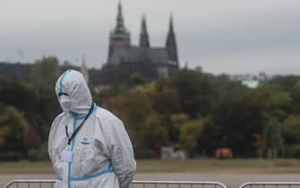 An election committee member wearing a protective equipment as a preventive measure against the coronavirus COVID-19 disease is pictured at a drive-in polling station for quarantined voters, on October 06, 2020 in Prague, ahead of the country's general election. - Polling stations will be official open on October 8 and 9, 2021 for the general election for Czech parliament. (Photo by Michal Cizek / AFP) (Photo by MICHAL CIZEK/AFP via Getty Images)