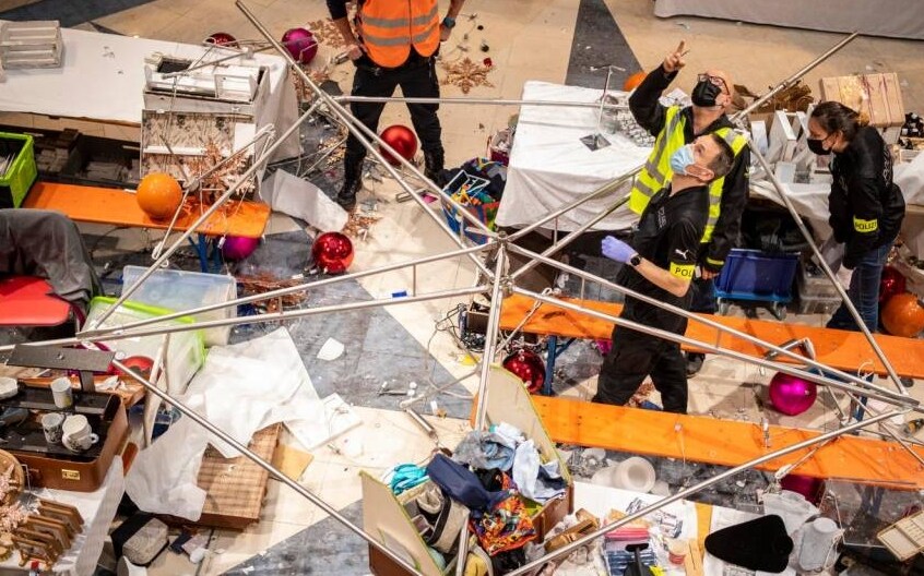 Switzerland, Christmas decoration collapses in shopping center.  Six wounded women