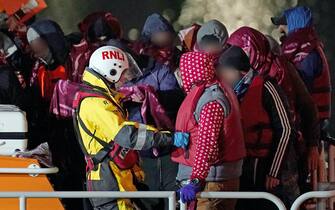 Migrants disembarking in Dover, England