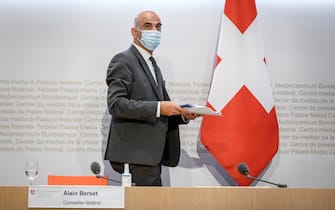 Swiss Interior and Health Minister Alain Berset leaves a press conference on Covid-19 restrictions after a meeting of the Swiss government in Bern on September 17, 2021. - People who have not been vaccinated and have not recovered from the coronavirus will have to present a negative Covid test to enter Switzerland from September 20, 2021. The Swiss government wants to avoid an increase of cases after the autumn holidays, it said. (Photo by Fabrice COFFRINI / AFP) (Photo by FABRICE COFFRINI/AFP via Getty Images)