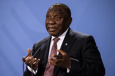 epa09432771 President of the South Africa Cyril Ramaphosa attends a press conference after the G20 Compact with Africa conference at the Chancellery in Berlin, Germany, 27 August 2021.  EPA/MAJA HITIJ / POOL