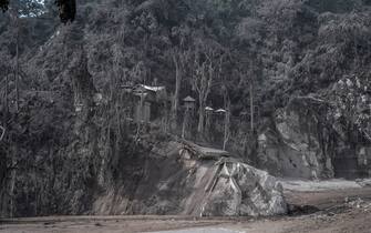 An area is seen covered in volcanic ash at Sumber Wuluh village in Lumajang on December 5, 2021, after the Semeru volcano eruption that killed at least 13 people. (Photo by JUNI KRISWANTO / AFP) (Photo by JUNI KRISWANTO/AFP via Getty Images)