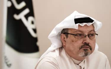 A general manager of Alarab TV, Jamal Khashoggi, looks on during a press conference in the Bahraini capital Manama, on December 15, 2014. The  pan-Arab satellite news broadcaster owned by billionaire Saudi businessman Alwaleed bin Talal will go on air February 1, promising to "break the mould" in a crowded field.AFP PHOTO/ MOHAMMED AL-SHAIKH (Photo by MOHAMMED AL-SHAIKH / AFP)        (Photo credit should read MOHAMMED AL-SHAIKH/AFP via Getty Images)