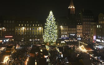 This picture taken on November 26, 2021 shows a view of the giant Christmas tree on the Place Kleber central square in Strasbourg, eastern France, on the opening day of the city's Christmas illuminations and traditional Christmas market. (Photo by FREDERICK FLORIN / AFP) (Photo by FREDERICK FLORIN/AFP via Getty Images)