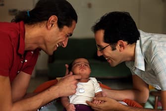 MUMBAI, INDIA - NOVEMBER 16, 2008: Surrogate Mother - Surrogacy - Gay Couple - Yonathan Gher (30) with his partner Omer at their rented residence in Santacruz where they lived for a month with their newborn son Evyatar Gher. On Monday, they took Evyatar born to an Indian surrogate mother to Israel. (Photo by Manoj Patil/Hindustan Times via Getty Images)