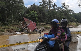 A damaged house is seen affected by flood water in Hulu Langat, outside Kuala Lumpur, Malaysia on 20 December, 2021. More than 50,000 people have been forced from their homes in Malaysia and at least seven are dead after the country faced some of its worst floods for years. (Photo by Mat Zain/NurPhoto)