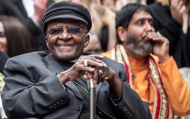 Nobel Peace Prize laureate and South African icon Archbishop Desmond Tutu attends the unveiling ceremony of the Arch for the Arch monument as part of celebrations for his 86th birthday on October 7, 2017 in Cape Town. - The Arch for the Arch, represents the 14 chapters of the South African constitution. (Photo by GIANLUIGI GUERCIA / AFP) (Photo by GIANLUIGI GUERCIA/AFP via Getty Images)