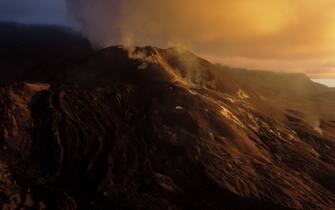 Aerial view of the Cumbre Vieja volcano, in Tacande, on the Canary Island of La Palma on December 16, 2021. - A volcanic eruption on the Spanish island of La Palma has shown its first sign it might be coming to an end after nearly three months, scientists said on December 15, 2021, although they could not rule out a new flare up in activity. The eruption of the Cumbre Vieja volcano has ebbed and flowed since it first began spewing lava on September 19, forcing the evacuation of over 7,000 people and destroying nearly 3,000 buildings. (Photo by JORGE GUERRERO / AFP) (Photo by JORGE GUERRERO/AFP via Getty Images)