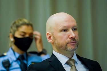Anders Behring Breivik (R) is pictured on the first day of the trial where he is requesting release on parole, on January 18, 2022 at a makeshift courtroom in Skien prison, Norway. - The mass murderer Anders Behring Breivik, who now calls himself Fjotolf Hansen, was in 2012 sentenced to a at least 21 years inprisonment. Under Norwegian law, Breivik is entitled to a review in court after the initial term of 10 years. 77 people lost their lives in the attacks that took place in Oslo and UtÃ¸ya (Utoya) on July 22, 2011. - Norway OUT (Photo by Ole Berg-Rusten / NTB / AFP) / Norway OUT (Photo by OLE BERG-RUSTEN/NTB/AFP via Getty Images)