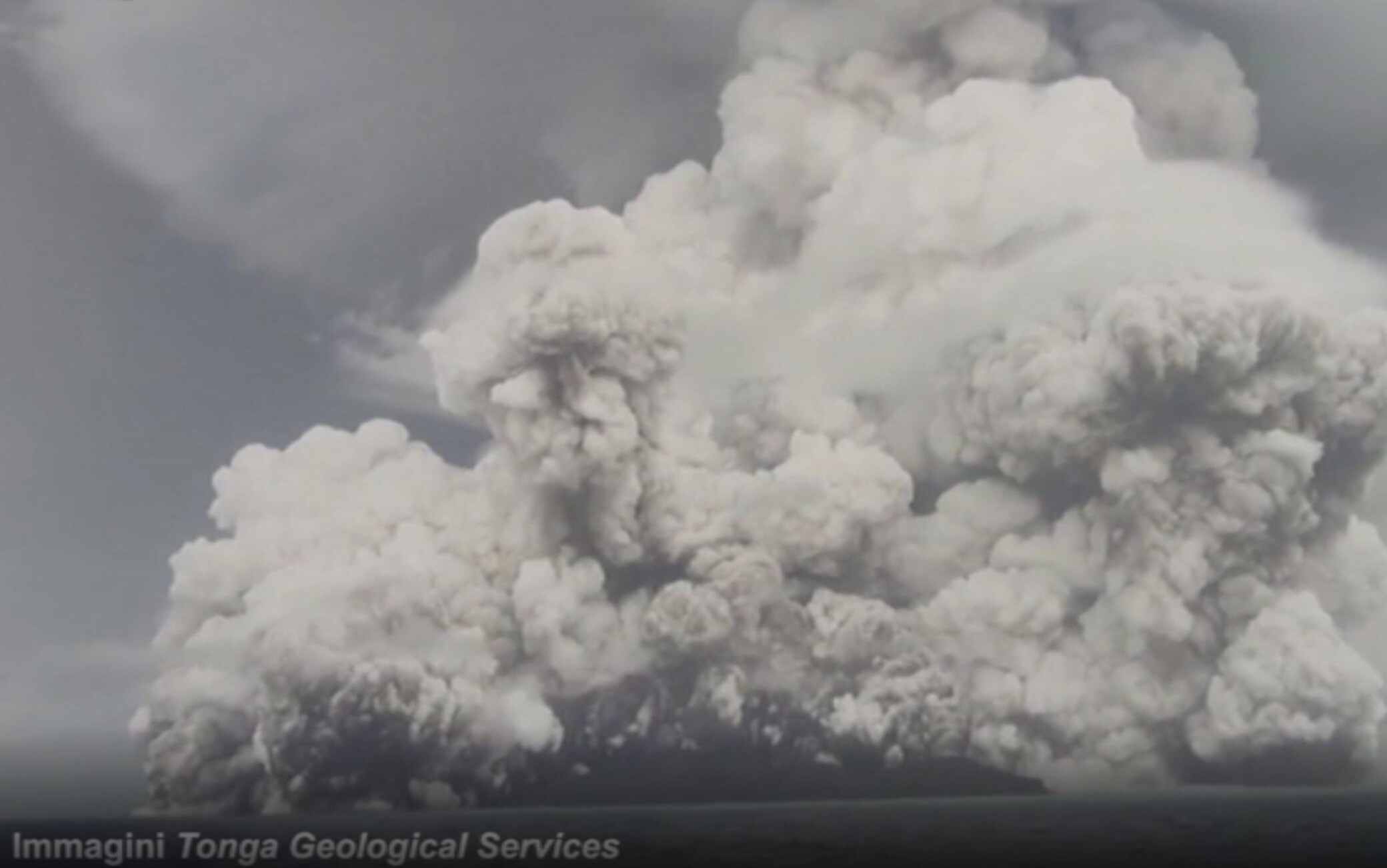 Tonga, after volcano eruption and tsunami. Cloud of ash and electric ...