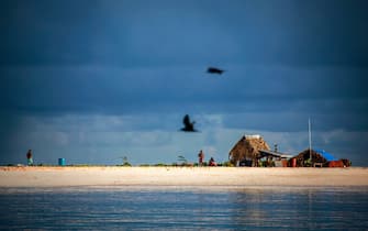 The small huts built by locals Binata Pinata and her husband Kaibakia can be seen on Bikeman Islet, located off South Tarawa in the central Pacific island nation of Kiribati on May 25, 2013.                                                                                            