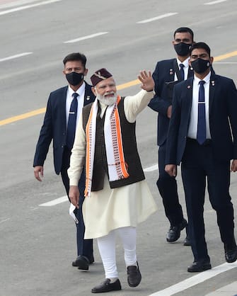 INDIA REPUBLIC DAY epa09709934 Indian Prime Minister Narendra Modi greets people during the 73rd Republic Day celebrations in New Delhi, India, 26 January 2022. The Republic Day of India marks the adoption of the constitution of India and the transition of the country to a Republic on 26 January 1950. EPA/HARISH TYAGI