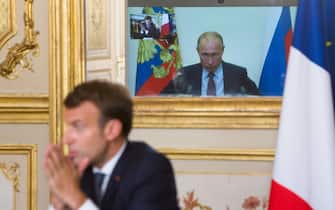 French President Emmanuel Macron talks to Russian President Vladimir Putin during a video conference Friday, June 26, 2020 at the Elysee Palace in Paris. Russian President Vladimir Putin holds video talks with French President Emmanuel Macron about the coronavirus, Libya, Syria and relations with the U.S. under Donald Trump. Photo by Raphael Lafargue/ABACAPRESS.COM