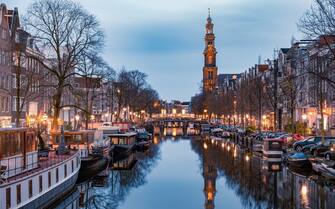 Amsterdam Amsterdam canals in the evening light, Dutch canals in Amsterdam Holland Netherlands during winter time in the Netherlands. Europe