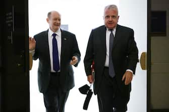 WASHINGTON, DC - MAY 24: U.S. Ambassador to Russia John Sullivan (R) leaves with Sen. Chris Coons (D-DE) (L) after a closed hearing before the Senate Foreign Relations Committee at the U.S. Capitol May 24, 2021 in Washington, DC. The committee held a closed hearing titled â  Update on the United States-Russia Bilateral Relationship.â   (Photo by Alex Wong/Getty Images)