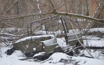 A destroyed car in Chernobyl