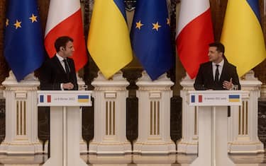 KYIV, UKRAINE - FEBRUARY 08: French President Emmanuel Macron (L) and Ukrainian President Volodymyr Zelensky speak to the media during a joint press conference after their meeting on February 08, 2022 in Kyiv, Ukraine. The meeting comes a day after Macron met with Russian President Vladimir Putin in Moscow and discussed several proposals in a five-hour long meeting in an effort to find common ground on Ukraine and NATO.  (Photo by Chris McGrath/Getty Images)