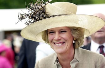 Camilla Parker-Bowles chats with crowds outside Holyrood House at the Royal Garden Party, Edinburgh.   (Photo by PA Images via Getty Images)