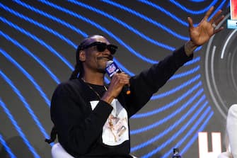 LOS ANGELES, CALIFORNIA - FEBRUARY 10:  Snoop Dogg speaks during the Pepsi Super Bowl LVI Halftime Show Press Conference at Los Angeles Convention Center on February 10, 2022 in Los Angeles, California. (Photo by Kevin Mazur/Getty Images for Roc Nation)