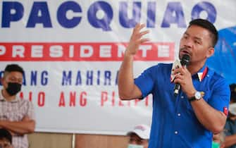 epa09760879 Filipino Senator and boxing icon Manny Pacquiao, a presidential contender in the May 2022 national elections, speaks to supporters during a campaign rally in Manila, Philippines, 16 February 2022. Pacquiao announced his retirement from the sport of boxing and has set to fight for president in the May 2022 national elections against popular contender Ferdinand 'Bongbong' Marcos Junior, son of former strongman Ferdinand Marcos.  EPA / FRANCIS R. MALASIG