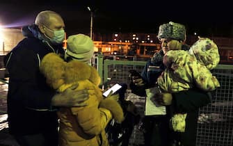 VOLZHSKY, VOLGOGRAD REGION, RUSSIA - FEBRUARY 20, 2022: People evacuated from the Donetsk and Lugansk People's Republic are seen at a railway station. Amid the escalating conflict in east Ukraine, on February 18, 2022, the heads of the Lugansk and Donetsk People's Republics announced a mass evacuation of civilians to Russia. The first train carrying 400 evacuated Donbass residents has arrived in the town of Volzhsky from Russia's Rostov-on-Don Region. Dmitry Rogulin/TASS

EDITORIAL USE ONLY. NO COMMERCIAL USE. NO ADVERTISING (Photo by Dmitry Rogulin\TASS via Getty Images)